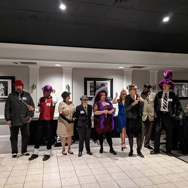 Whodunnit? The suspect line up at our company Mystery Party! Fun was had by all!